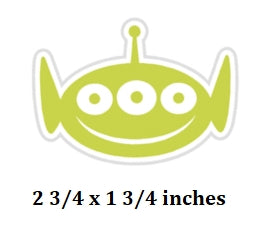 Green alien-shaped sticker with text indicating size